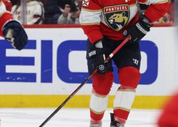 May 11, 2025; Sunrise, Florida, USA; Florida Panthers defenseman Aaron Ekblad (5) skates with the puck against the Toronto Maple Leafs during the first period in game four of the second round of the 2025 Stanley Cup Playoffs at Amerant Bank Arena. Mandatory Credit: Kim Klement Neitzel-Imagn Images