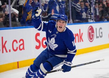 Apr 20, 2025; Toronto, Ontario, CAN; Toronto Maple Leafs forward Mitch Marner (16) reacts after scoring against the Ottawa Senators during the first period of game one of the first round of the 2025 Stanley Cup Playoffs at Scotiabank Arena. Mandatory Credit: John E. Sokolowski-Imagn Images