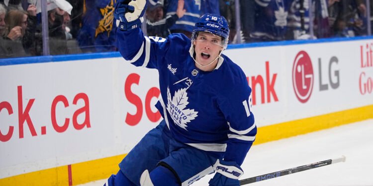 Apr 20, 2025; Toronto, Ontario, CAN; Toronto Maple Leafs forward Mitch Marner (16) reacts after scoring against the Ottawa Senators during the first period of game one of the first round of the 2025 Stanley Cup Playoffs at Scotiabank Arena. Mandatory Credit: John E. Sokolowski-Imagn Images