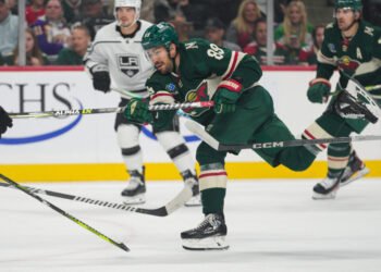 Oct 19, 2023; Saint Paul, Minnesota, USA; Minnesota Wild center Frederick Gaudreau (89) shoots against the Los Angeles Kings in the first period at Xcel Energy Center. Mandatory Credit: Matt Blewett-USA TODAY Sports