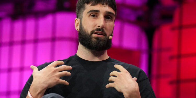 Aidan Gomez, co-founder of Cohere, attends the Collision Conference in Toronto on Tuesday, June 18, 2024.THE CANADIAN PRESS/Chris Young