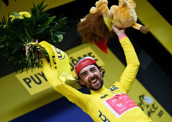 LE MONT-DORE PUY DE SANCY, FRANCE - JULY 14: Ben Healy of Ireland and Team EF Education - EasyPost celebrates at podium as Yellow leader jersey winner during the 112th Tour de France 2025, Stage 10 a 165.3km stage from Ennezat to Le Mont-Dore Puy de Sancy (Super Sancy) 1318m / #UCIWT / on July 14, 2025 in Le Mont-Dore Puy de Sancy, France. (Photo by Tim de Waele/Getty Images)