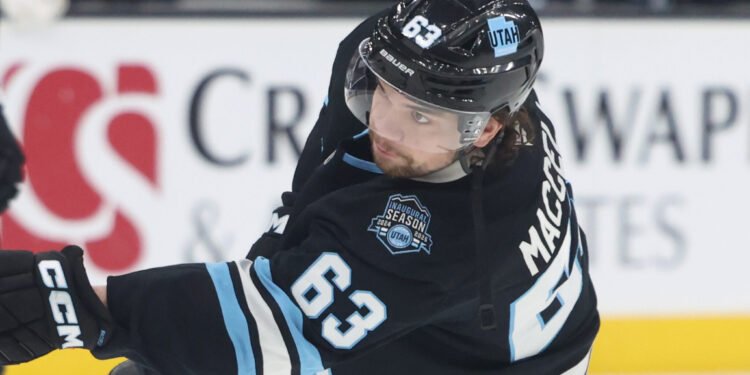 Mar 24, 2025; Salt Lake City, Utah, USA; Utah Hockey Club left wing Matias Maccelli (63) warms up before a game against the Detroit Red Wings at Delta Center. Mandatory Credit: Rob Gray-Imagn Images
