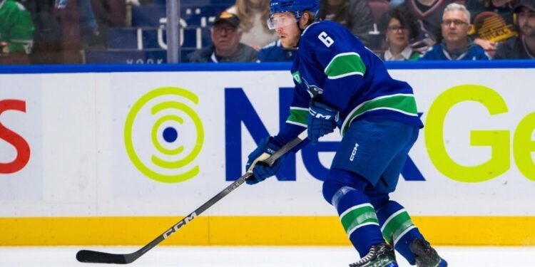 May 16, 2024; Vancouver, British Columbia, CAN; Vancouver Canucks forward Brock Boeser (6) handles the puck against the Edmonton Oilers during the first period in game five of the second round of the 2024 Stanley Cup Playoffs at Rogers Arena. Mandatory Credit: Bob Frid-USA TODAY Sports