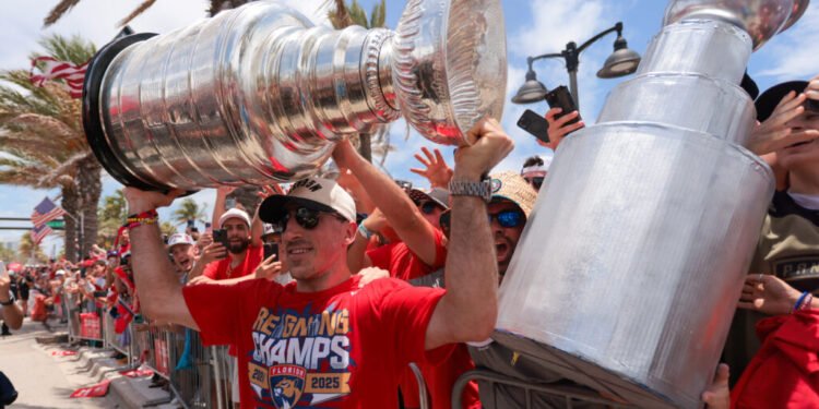 Jun 22, 2025; Fort Lauderdale, Florida, UNITED STATES; Florida Panthers center Brad Marchand (63) celebrates with the Stanley Cup during the Stanley Cup championship parade and rally. Mandatory Credit: Sam Navarro-Imagn Images
