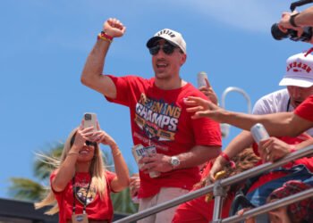 Jun 22, 2025; Fort Lauderdale, Florida, UNITED STATES; Florida Panthers center Brad Marchand (63) celebrates during the Stanley Cup championship parade and rally. Mandatory Credit: Sam Navarro-Imagn Images