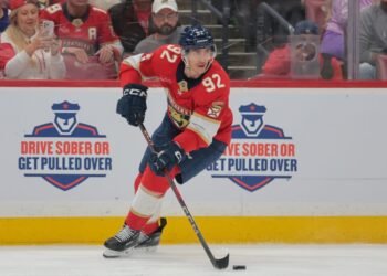 May 9, 2025; Sunrise, Florida, USA; Florida Panthers left wing Tomas Nosek (92) moves the puck against the Toronto Maple Leafs during the second period in game three of the second round of the 2025 Stanley Cup Playoffs at Amerant Bank Arena. Mandatory Credit: Sam Navarro-Imagn Images