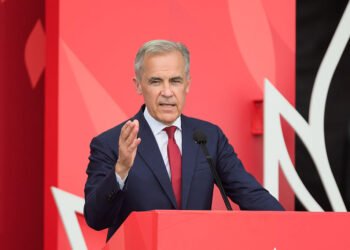Mark Carney, Canada's prime minister, speaks at LeBreton Flats on Canada Day in Ottawa, Ontario, Canada, on Tuesday, July 1, 2025. Canada Day, which has been celebrated since 1868, also coincides this year with the 60th anniversary of the Canadian flag. Photographer: James Park/Bloomberg via Getty Images