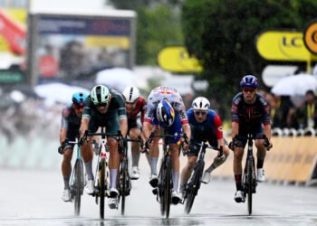 VALENCE, FRANCE - JULY 23: (L-R) Davide Ballerini of Italy and Team XDS Astana, Jonathan Milan of Italy and Team Lidl - Trek - Green Sprint Jersey, Arnaud De Lie of Belgium and Team Lotto, Jordi Meeus of Belgium and Team Red Bull - BORA - hansgrohe, Paul Penhoet of France and Team Groupama - FDJ and Tobias Lund Andresen of Denmark and Team Picnic PostNL sprint at finish line during the 112th Tour de France 2025, Stage 17 a 160.4km stage from Bollene to Valence / #UCIWT / on July 23, 2025 in Valence, France. (Photo by Tim de Waele/Getty Images)