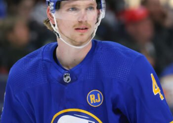 Mar 9, 2024; Buffalo, New York, USA;  Buffalo Sabres defenseman Bowen Byram (4) during a stoppage in play against the Edmonton Oilers during the third period at KeyBank Center. Mandatory Credit: Timothy T. Ludwig-USA TODAY Sports