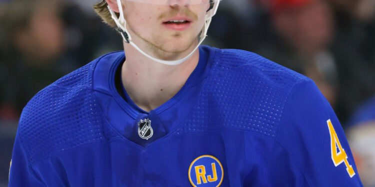 Mar 9, 2024; Buffalo, New York, USA;  Buffalo Sabres defenseman Bowen Byram (4) during a stoppage in play against the Edmonton Oilers during the third period at KeyBank Center. Mandatory Credit: Timothy T. Ludwig-USA TODAY Sports