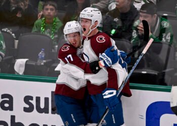 May 3, 2025; Dallas, Texas, USA; Colorado Avalanche center Parker Kelly (17) and defenseman Josh Manson (42) celebrates a goal scored by Manson against the Dallas Stars during the second period in game seven of the first round of the 2025 Stanley Cup Playoffs at American Airlines Center. Mandatory Credit: Jerome Miron-Imagn Images