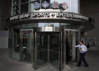 A man walks into Maple Leafs Sports and Entertainment's office at the Air Canada Centre in Toronto Wednesday, Dec. 1, 2010. THE CANADIAN PRESS/Darren Calabrese
