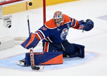 Jun 6, 2025; Edmonton, Alberta, CAN; Edmonton Oilers goaltender Stuart Skinner (74) makes a save against the Florida Panthers during the second period in game two of the 2025 Stanley Cup Final at Rogers Place. Mandatory Credit: Walter Tychnowicz-Imagn Images