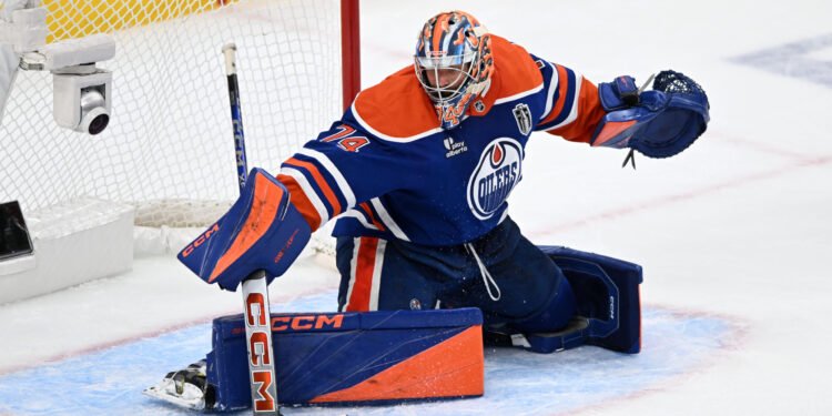 Jun 6, 2025; Edmonton, Alberta, CAN; Edmonton Oilers goaltender Stuart Skinner (74) makes a save against the Florida Panthers during the second period in game two of the 2025 Stanley Cup Final at Rogers Place. Mandatory Credit: Walter Tychnowicz-Imagn Images