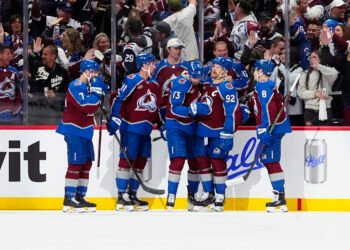 May 1, 2025; Denver, Colorado, USA; Colorado Avalanche right wing Valeri Nichushkin (13) (center) celebrates his goal with defenseman Devon Toews (7), defenseman Cale Makar (8),left wing Gabriel Landeskog (92), defenseman Cale Makar (8) and center Brock Nelson (11) in the first period against the Dallas Stars in game six of the first round of the 2025 Stanley Cup Playoffs at Ball Arena. Mandatory Credit: Ron Chenoy-Imagn Images