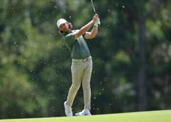 Aug 9, 2025; Memphis, Tennessee, USA; Tommy Fleetwood walks down the second fairway during the third round of the FedEx St. Jude Championship golf tournament. Mandatory Credit: Steve Roberts-Imagn Images