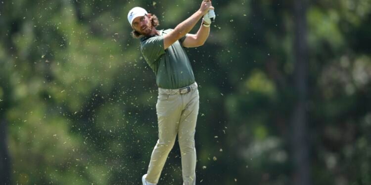 Aug 9, 2025; Memphis, Tennessee, USA; Tommy Fleetwood walks down the second fairway during the third round of the FedEx St. Jude Championship golf tournament. Mandatory Credit: Steve Roberts-Imagn Images