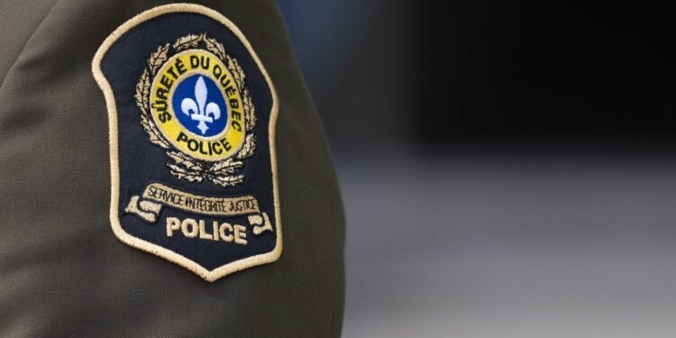 A Surete du Quebec police shoulder patch is seen in Montreal, Tuesday, Sept. 10, 2024. THE CANADIAN PRESS/Christinne Muschi