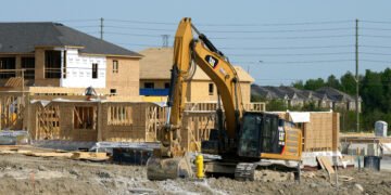A new housing development is constructed just outside the edge of the Duffins Rouge Agricultural Preserve, part of Ontario's Greenbelt, on Monday, May 15, 2023, THE CANADIAN PRESS/Chris Young