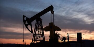 Gas station price sign showing record high gas prices in Canada amid Middle East conflict