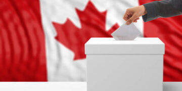 Canadian Parliament building in Ottawa amid April by-elections impacting Liberal majority