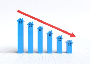 Apartment buildings in Canadian city with 'For Rent' sign amid rising vacancy rates