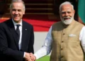 Carney (left) and Modi pledged to increase co-operation in a range of areas, including defence and technology